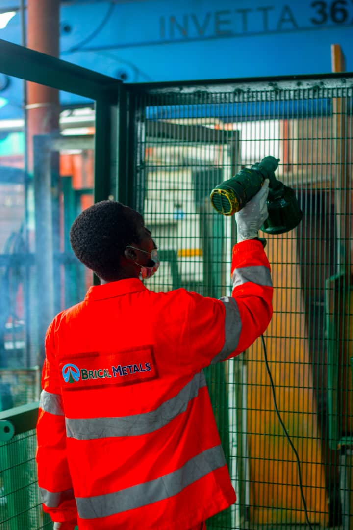Brical Metals team member working on a welded mesh fencing system